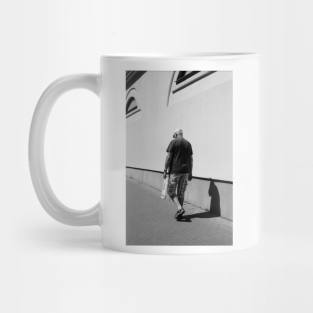 Man looking down Mug